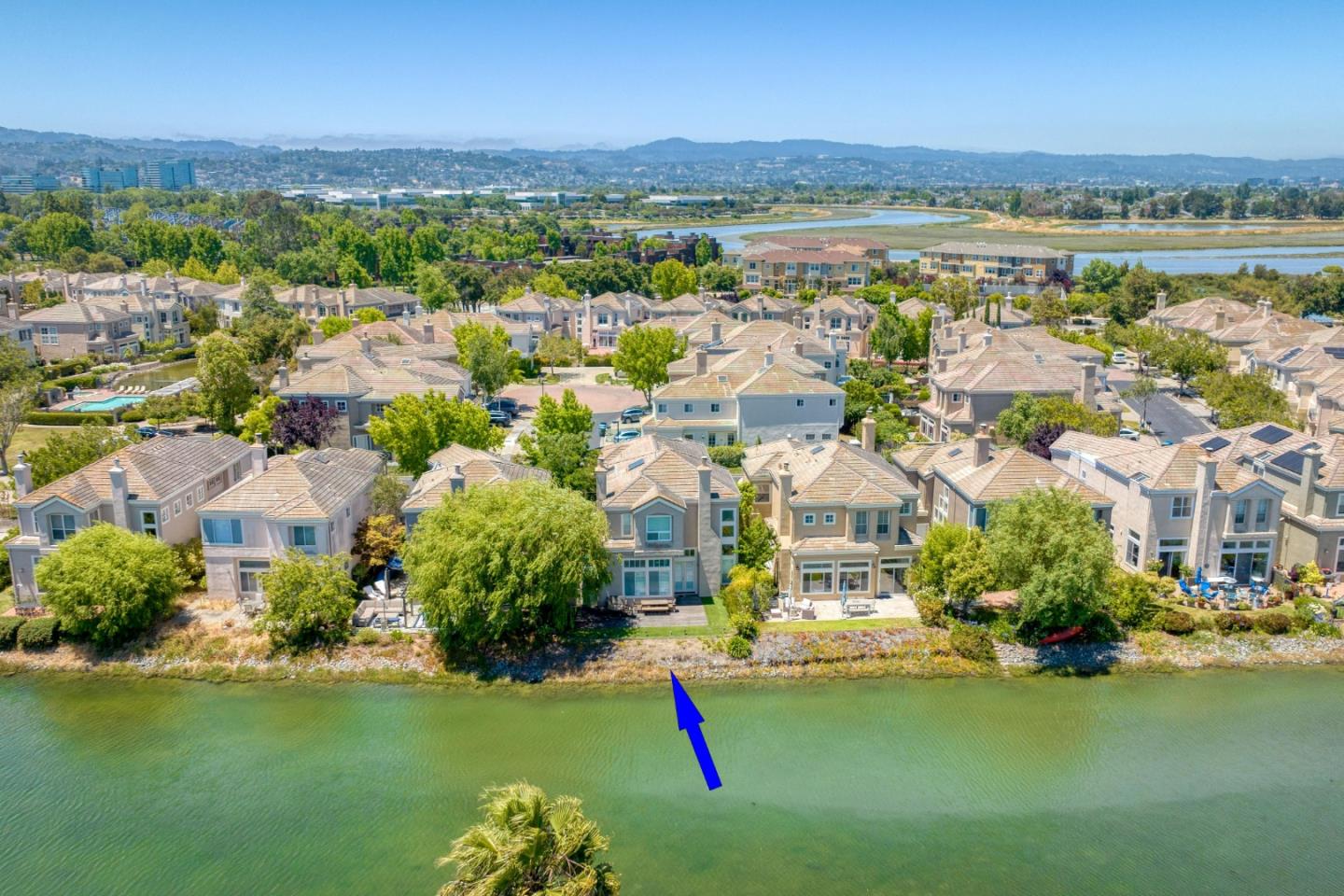 Spacious waterfront home overlooking expansive Redwood Shores Lagoon.