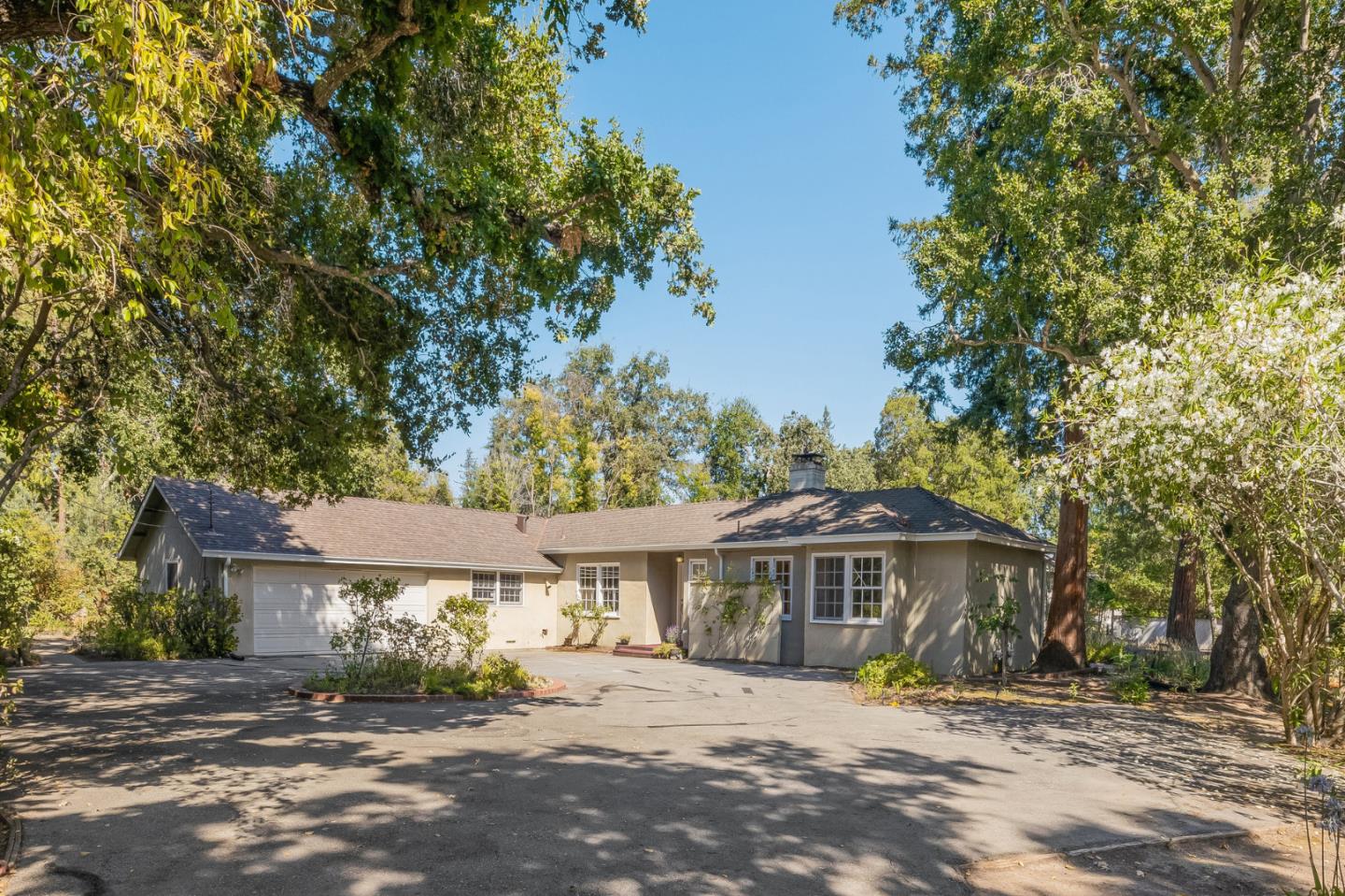 285 Camino Al Lago presents a unique opportunity to expand, renovate, or build new on an approximately 1.25 acre parcel in prime West Atherton. The private and serene setting is sheltered from the street and showcases majestic heritage trees. The home falls in the coveted Las Lomitas School District and also offers outstanding private schools. Enjoy a close proximity to downtown Menlo Park and Palo Alto, the Menlo Circus Club, Stanford University, and Sand Hill Road. A short 20 +/- minute drive to both San Francisco and San Jose International Airports.