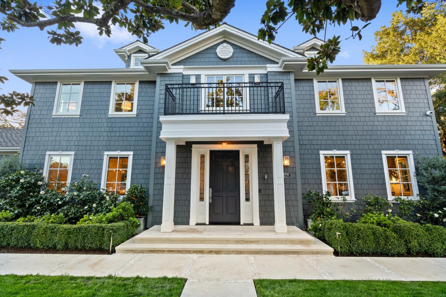 Presenting classic East Coast styling, this home is picture-perfect on a corner lot of more than one-quarter acre in the heart of central Menlo Park. Built in 2015, the home spans three levels and features 7 bedrooms and 5.5 baths. With a shingled exterior, the design is ever so inviting and expertly executed inside and out. Throughout, beautiful hardwood floors, crisp white millwork, and designer lighting combine seamlessly, crafting an ambiance that is both sophisticated and eminently livable. The floor plan is ideally arranged with formal rooms positioned at the front of the home leading to a superb gourmet kitchen and family room combination that opens to the rear grounds and pool. A spacious lower-level recreation/media room with a full bar offers ample space for relaxation and entertainment. Luxurious personal accommodations include a main-level suite, perfect for guests and also suitable for a home office.