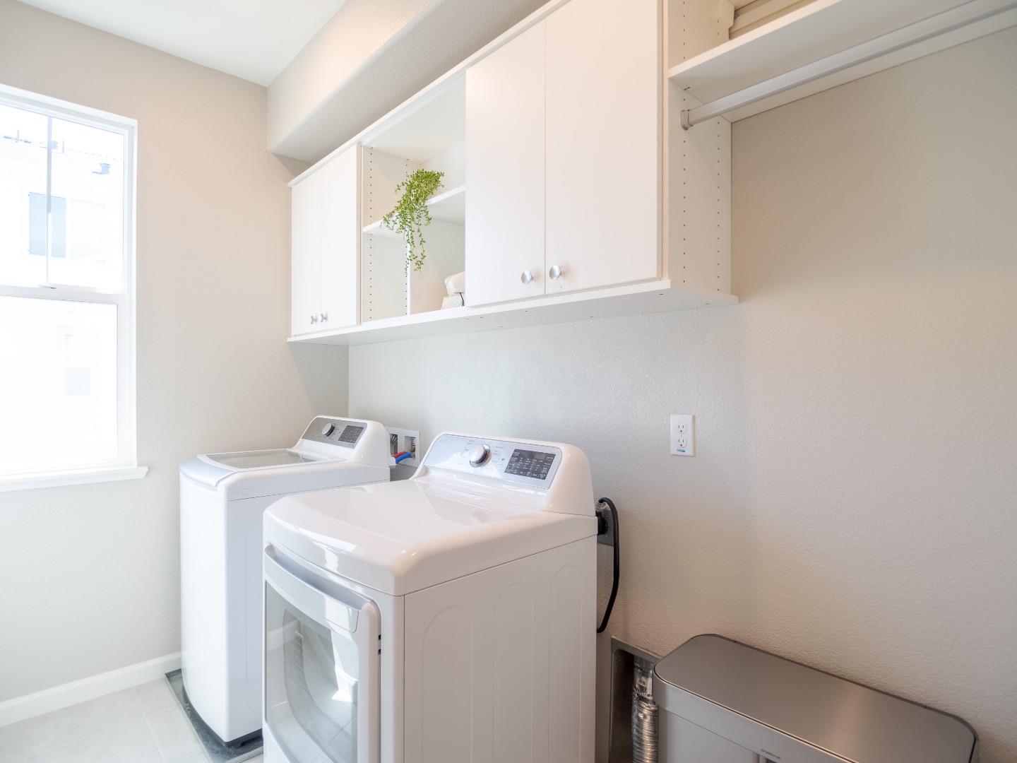Main floor laundry room, located off of the kitchen.