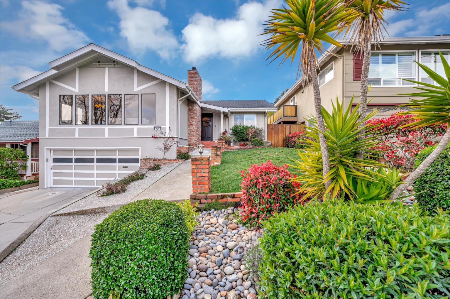 Perfectly situated on a cul-de-sac in one of San Bruno's most exclusive neighborhoods, this Parkview Terrace Home is move-in ready. Lovingly cared for, by the same owner, for over 35 years, this home boasts pride of ownership. The upper level features three bedrooms (Primary with sliding glass doors leading to expansive deck), two remodeled baths, sun-filled living room with wood-burning fireplace and recessed lighting, formal dining room and updated eat-in kitchen with granite counters, recessed lighting and sliding door leading to side decking. The lower level features a large family room with recessed lighting and window bench seating/storage and one full bath with stall shower. Entertaining and relaxing is a must in the rear yard compete with large grass area, expansive deck and cement patio. Large two-car attached garage with washer/dryer and extra storage. An outstanding location - just blocks to San Bruno Park where you can enjoy its picnic grounds, playgrounds, tennis courts and soon "state of the art" Gym and Aquatics Center (under development). Truly a must see!