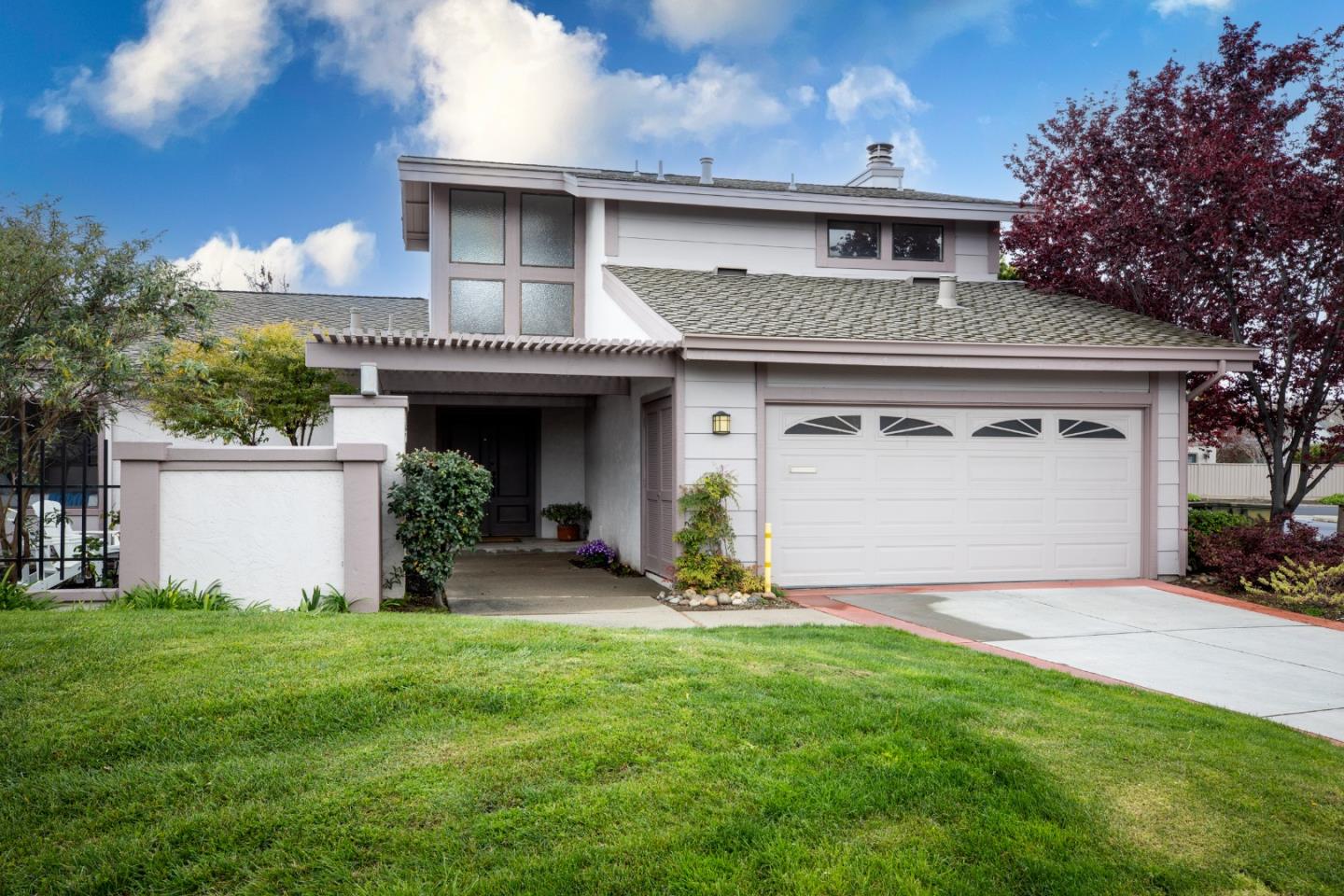 Bayporte community gem steps to Catamaran Park & lagoons for all the Foster City water sports. This single-family home, with one common wall, was recently remodeled and updated under the guidance of a leading interior designer, and has spacious wraparound gardens and patios on three sides including private rear gardens and flagstone patio. Freshly painted, new high-end 7.5 " Monarch Plank hardwood floors, recently remodeled bathroom with Carrara marble style tiles, towering ceilings, and amazing natural light. Spacious living and dining room combo, all-white kitchen and family room, plus main-level primary suite and adjacent bedroom and bath perfect for a nursery or office. Two upstairs bedrooms and bath plus indoor laundry room and attached 2-car garage. Just down the street is tennis, volleyball, soccer, a playground, and waterfront beach plus this home has access to excellent Foster City schools. Ideal peninsula location midway between Silicon Valley and San Francisco and less than 15 minutes to SFO.