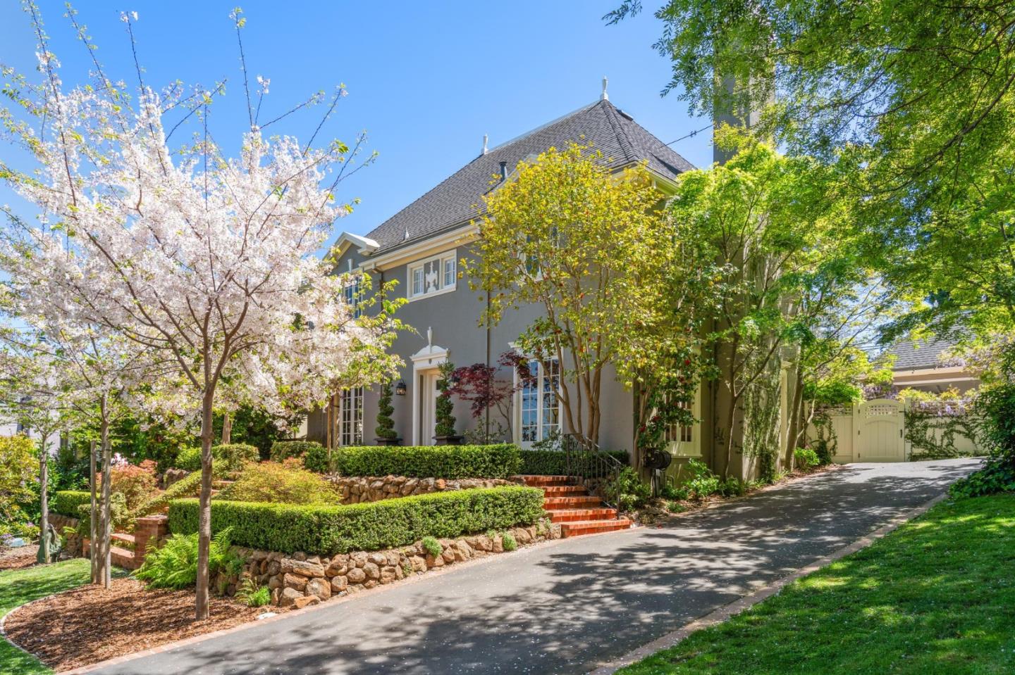 Prominently located in prestigious San Mateo Park, this stately Georgian manor is a testament to architectural elegance combined with modern luxury. Set beyond gates and preceded by flowering parterre gardens, the property provides sublime privacy and spans just over one-third acre with a fabulous rear yard that includes a sparkling pool and spa. The interiors are beautifully appointed with gleaming hardwood floors. Classic elements like picture frame wall moldings underscore the homes architectural pedigree. Formal living and dining rooms give way to the heart of the home where a stunning kitchen and family room combination unfolds for 21st century living, all easily connecting to the rear grounds and pool. Upstairs, there are three spacious bedrooms, highlighted by the primary suite with two extra-large walk-in closets and luxe bath with heated floors and period-style clawfoot tub. Two additional bedrooms share a newly remodeled bath, also with heated floor. Adding the finishing touch is the poolside cabana with full bath which is thoughtfully plumbed for an easy ADU conversion. Combining refined architectural elegance with everything needed for todays style of living, this is a very special place to call home in San Mateos most coveted neighborhood.