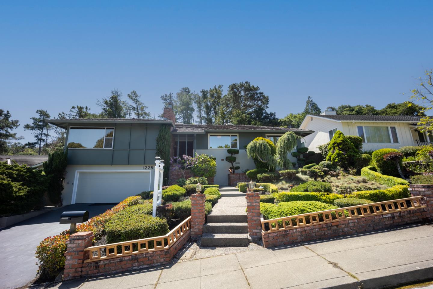 Welcome to 1225 Murchison Drive, Millbrae - a stunning contemporary 4bd, 3ba home. Completely updated - this beautifully crafted home offers a seamless blend of modern elegance & functional design, providing the ultimate sanctuary. As you enter, you're greeted by an abundance of natural light flooding through expansive windows, w/ neighborhood & nature views. Open-concept layout effortlessly connects the living room, dining area, & gourmet kitchen. Chef-inspired kitchen features top-of-the-line appliances, custom cabinetry, & large island w/ bar seating.  Retreat to the luxurious primary suite feat an ensuite bathroom that incl a walk in shower. Two additional guest bedrooms w/ plenty of natural light. Guest bathroom feat double vanity sinks & shower over tub. On the lower level, find a huge bonus space that is perfect for multi-generational living or can be rented out for additional income. Lower level incl bathroom w/ walk in shower along w/ ability to install stovetop. Step outside to discover a beautifully landscaped yard & deck. Conveniently located in the highly sought-after Millbrae neighborhood, this home offers easy access to top-rated schools, parks, shopping, & dining.  With its unparalleled blend of luxury & comfort. dont miss out on this beautiful home!