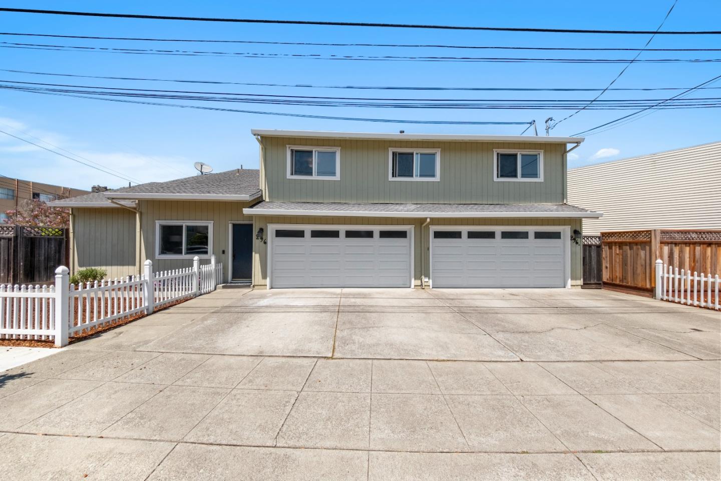 Charming and unique corner lot duplex at 296 Terrace Avenue located in the San Bruno Park neighborhood, the heart of San Bruno.  Built in 1977, this property's main unit features 3 bedrooms and 3.5 baths, including an ensuite bathroom in the primary bedroom. The third level offers an impressive bonus space with potential use as a 4th bedroom/office with a full bathroom. Adjacent to the private patio, the well-appointed kitchen has stainless steel appliances, granite countertops, and inset birch cabinetry. Second unit features an equally well-equipped kitchen with a loft bedroom, bathroom,  in-unit washer and dryer, and private patio, ideal for guests or rental income. The main unit offers 2,105 s/f and the second unit has 760 s/f of living space, along with two 2-car garages.  Prime location near Tanforan Mall, Artichoke Joe's, and downtown San Bruno. Easy access to CalTrain, BART, highways 101 & 280, and just 3 miles from SFO. Ideal for investors or multi-family living.