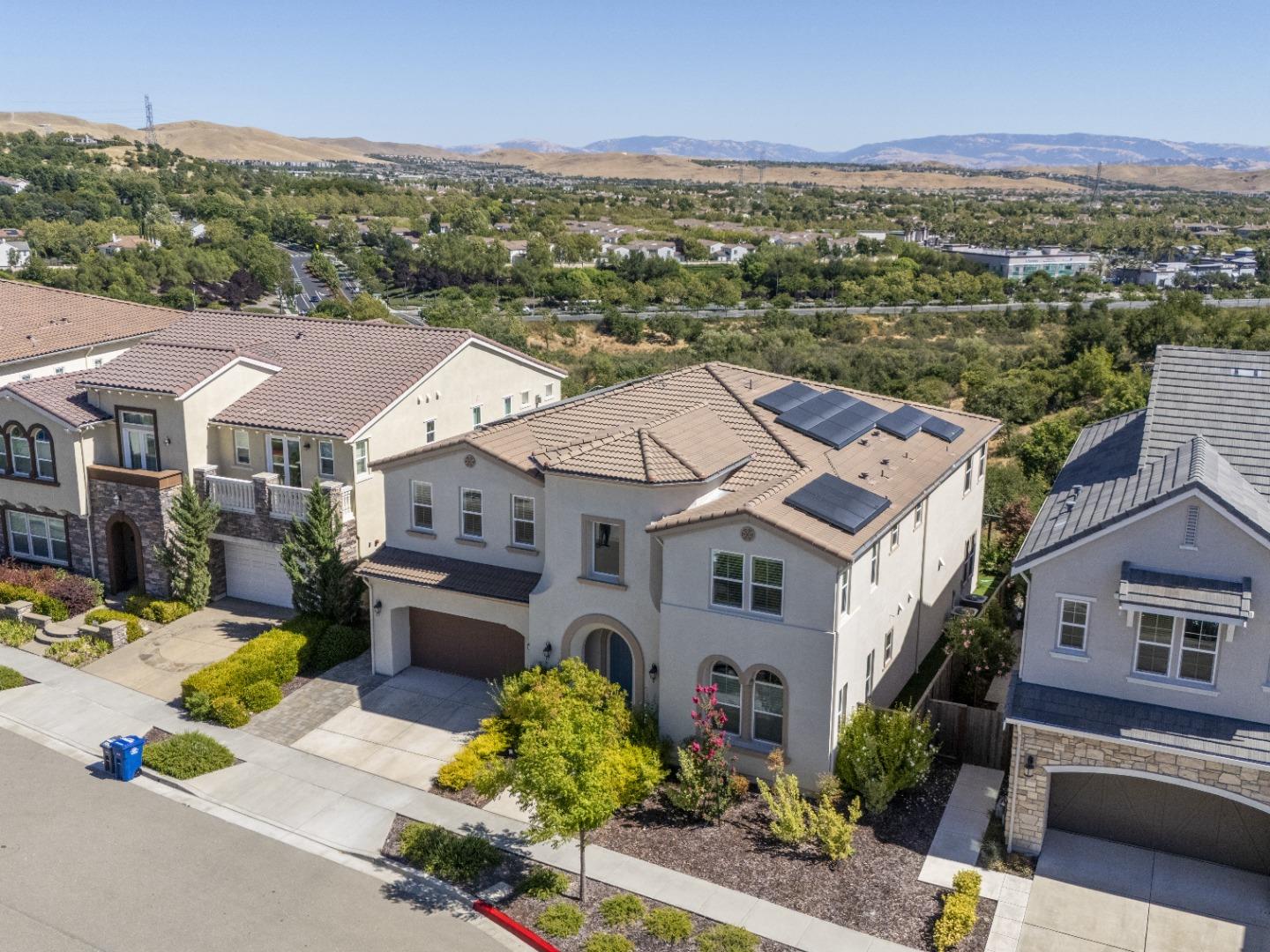 [Back on Market; No Fault of Seller] VIEWS, VIEWS, VIEWS! This stunning 8-year-old luxury home in the sought-after Gale Ranch neighborhood offers breathtaking panoramic vistas and modern amenities. Inside, an open-concept floor plan features spacious, sunlit rooms with high-end finishes that blend elegance and comfort. At the center of the home is a chefs kitchen with an oversized island, top-tier appliances, and custom cabinetryperfect for both cooking and gathering. The outdoor living areas are equally impressive, including a California room, covered patio, and a beautifully landscaped backyard ideal for entertaining or relaxing while enjoying the views. Designed for comfort and convenience, the home includes multiple en-suite bedrooms, with a guest suite on the main floor. The luxurious primary suite has a private balcony, spa-like bathroom, and large walk-in closets for a true retreat experience. Other features include a large loft, epoxy-coated garage with a Tesla EV charger, smart home technology, solar panels, and multiple Tesla Powerwalls for energy efficiency. Located within short distance of top-rated schools, parks, and shopping plazas, this home balances sophistication and practicality, making it perfect for any family.