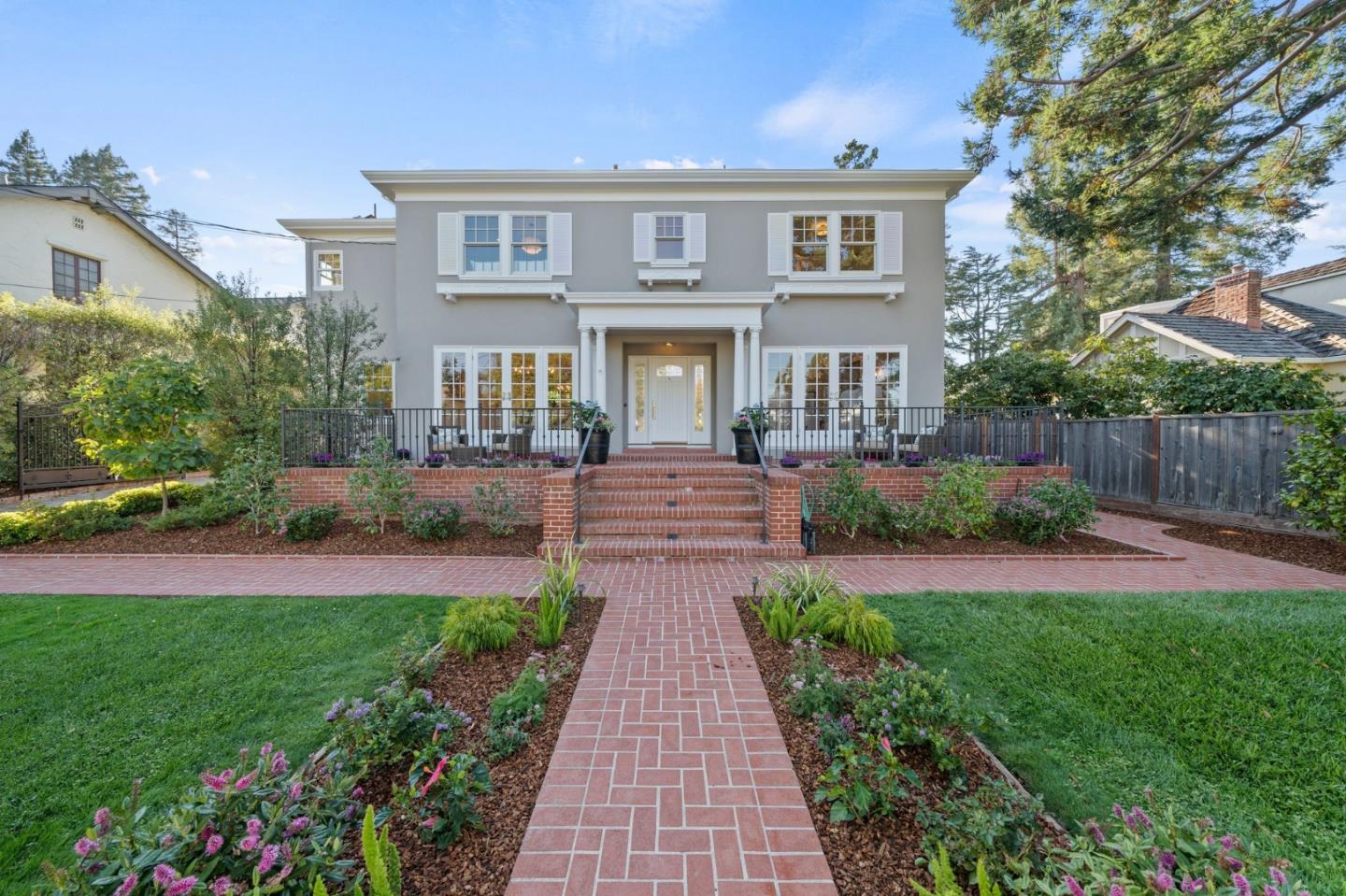 Classic Georgian-style home in prestigious San Mateo Park, this elegant residence features 4 bedrooms and 3 bathrooms across approximately 3,348 square feet. Highlights include a grand foyer, spacious living and dining rooms, a light-filled eat-in kitchen open to the family room, and French doors leading to a beautifully landscaped backyard. The main level also offers a full guest suite, an office, and a large laundry room. Upstairs, the luxurious primary suite features a walk-in closet and ensuite bathroom. With a large two-car garage and ideally located just minutes from downtown Burlingame, this home seamlessly blends timeless charm with modern living.