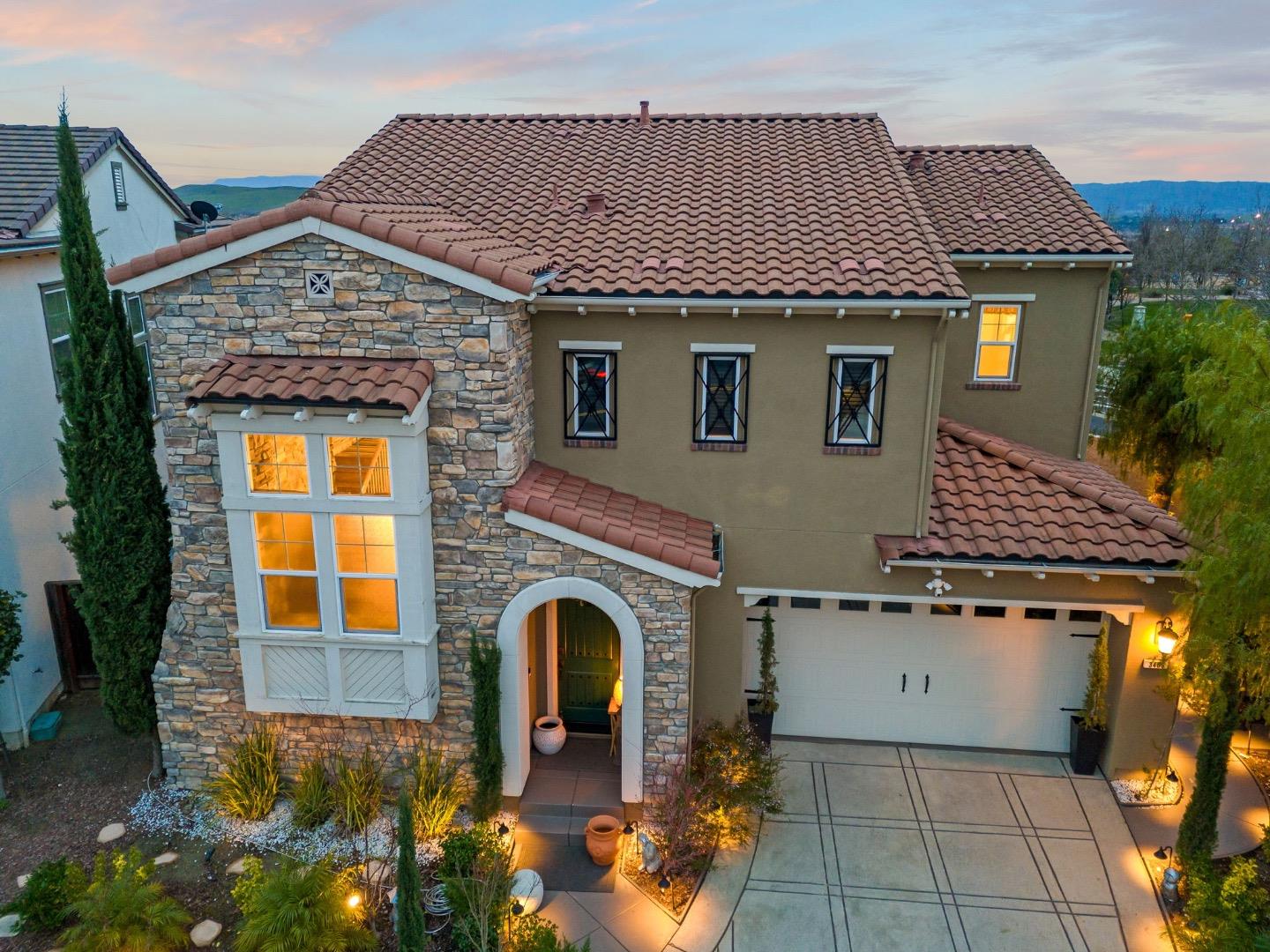 Welcome to 3489 Ironwood Dr, an exquisite former Toll Brothers model home in the prestigious Avanti at Gale Ranch community in San Ramon. This luxurious 4-bedroom,4.5-bathroom residence spans 3,177 sq. ft. on a 6,377 sq. ft. lot,showcasing high-end upgrades and impeccable craftsmanship. Step inside to a thoughtfully designed floor plan featuring a ground-floor en-suite bedroom,perfect for guests or multi-generational living. The open-concept main living area boasts soaring ceilings, abundant natural light, and seamless integration with the chefs kitchen, complete with top-of-the-line stainless steel appliances, granite countertops, and custom cabinetry. Upstairs, the primary suite offers a spa-like retreat with dual vanities, a soaking tub, and a glass-enclosed shower. Of the two additional bedrooms, one features an en-suite bath, while the other has a separate full bath nearby. A spacious loft with a built-in media center serves as a second family room, perfect for relaxation and entertainment. The professionally landscaped backyard is ideal for outdoor dining, featuring a fire pit and ample space to unwind. With exceptional craftsmanship,extensive upgrades,and versatile living spaces,3489 Ironwood Dr is a rare opportunity in one of San Ramons most sought-after neighborhoods.