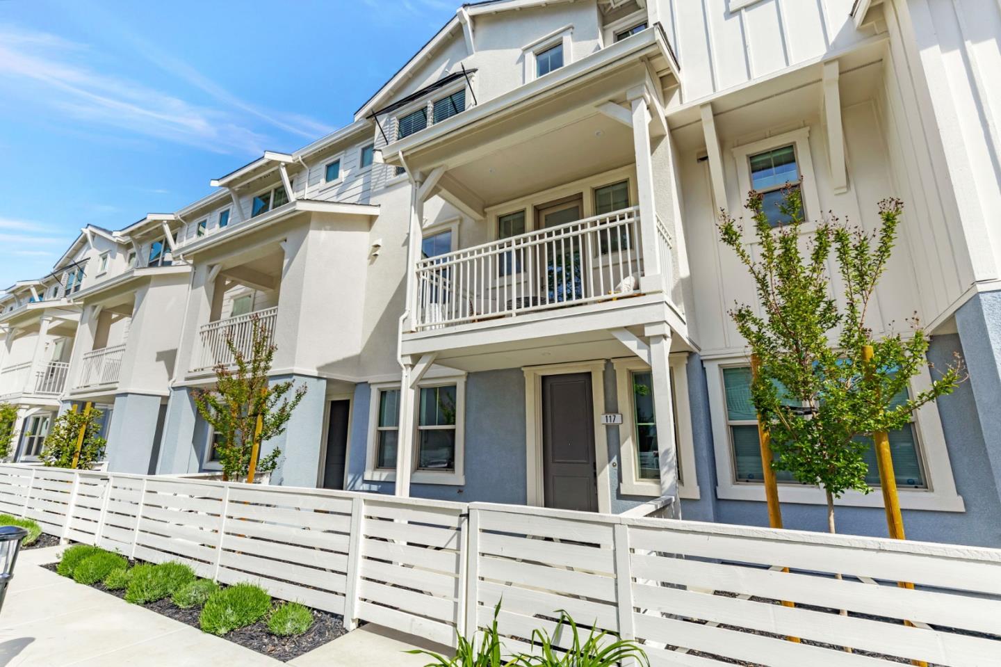Brand new and move-in ready! Discover your dream home at Oak Grove in Walnut Creek, a community of 125 new townhomes by award-winning SummerHill Homes. This Plan 5 home features 4 bedrooms, 3.5 bathrooms, 2,050 sq ft, and a side-by-side 2-car-attached garage. Enjoy gorgeous park views, a fenced front yard ideal for gardening, a covered front porch, and a private covered balcony. The spacious open-concept layout includes a large gourmet kitchen with pantry, a generous island, and plenty of natural light from high ceilings and large windows. Designer upgrades include white soft-close cabinets, engineered wood flooring, recessed lighting in every room, Bosch appliances, quartz countertops, full tiled backsplash, and energy-saving solar panels. Located just a short walk to BART and nearby restaurants, across from Walden Park, close to downtown Walnut Creek, with easy access to HWY 680 & 24, and part of a highly rated school district, this is an opportunity you don't want to miss!