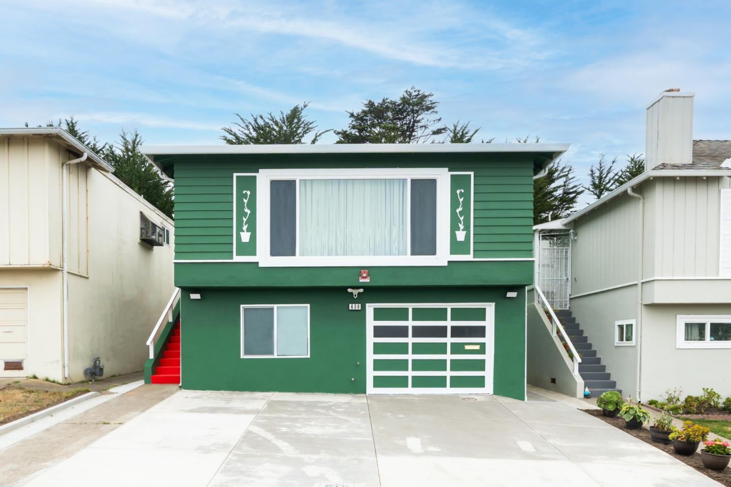 This extensively renovated home offers 2,098 square feet of thoughtfully designed living space - perfect for families or those seeking rental income opportunities. The upstairs level features two large bedrooms, each with a private bathroom. Enjoy breathtaking views of the Golden Gate Bridge, San Francisco skyline, and peninsula vistas from your living room. The downstairs offers two additional bedrooms with an extra room for office/den, each with a private bathroom. Both levels include their own laundry facilities with washers and dryers. Everything in this home is brand new and built to the highest standards and building codes. The renovation spared no expense, featuring:  ADU potential New roof for decades of protection Owned solar system Remodeled bathrooms with premium fixtures and heated bidets Modern kitchen with new appliances New flooring Fresh interior and exterior paint Two high-efficiency tankless water heaters Electric car charger New fire system for safety New sewer lateral connected to main line Two new furnaces and HVAC system Freshly poured concrete in driveway and backyard New drywall and insulation  You're just a short distance from beaches, schools, convenient shopping at Serramonte Center, and grocery runs to 99 Ranch Market. Your dream home awaits!