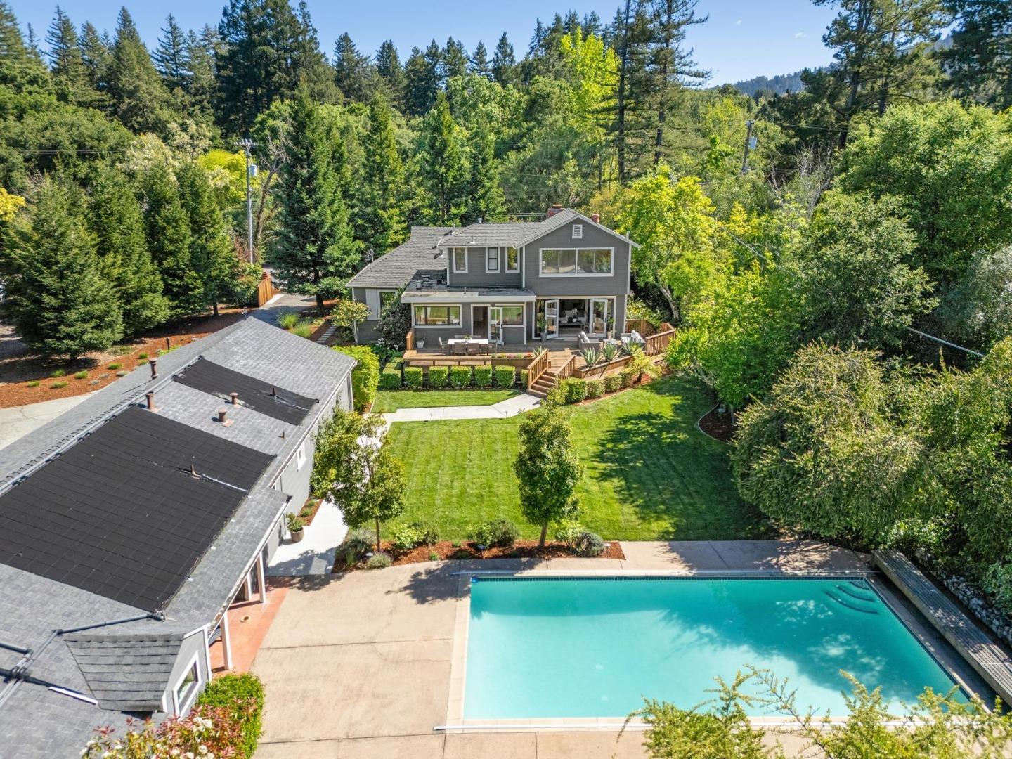 Idyllic Woodside on Over One Acre Close to Town This is a sun-filled Woodside property on over one level acres, where sun-filled land, equestrian facilities, and close-in convenience come together just one-half mile from the Town Center. The expansive, level grounds set the tone complete with a barn, fenced paddocks, pool, and broad stretches of lawn that capture the true spirit of country living. The home has been beautifully updated with a fresh, cohesive design that includes all-new lighting, a fully renovated kitchen, and renovated bathroom. The interiors feel bright, current, and immediately livable, and a stunning remodeled 1 bedroom 1.5 bath guest house adds valuable flexibility for extended stays, office use, or possible rental. Beyond what is already in place, the scale and level nature of the property presents outstanding opportunity. Expansion, further personalization, or even the creation of a new estate can all be envisioned here, making this property as compelling for today as it is for the future.