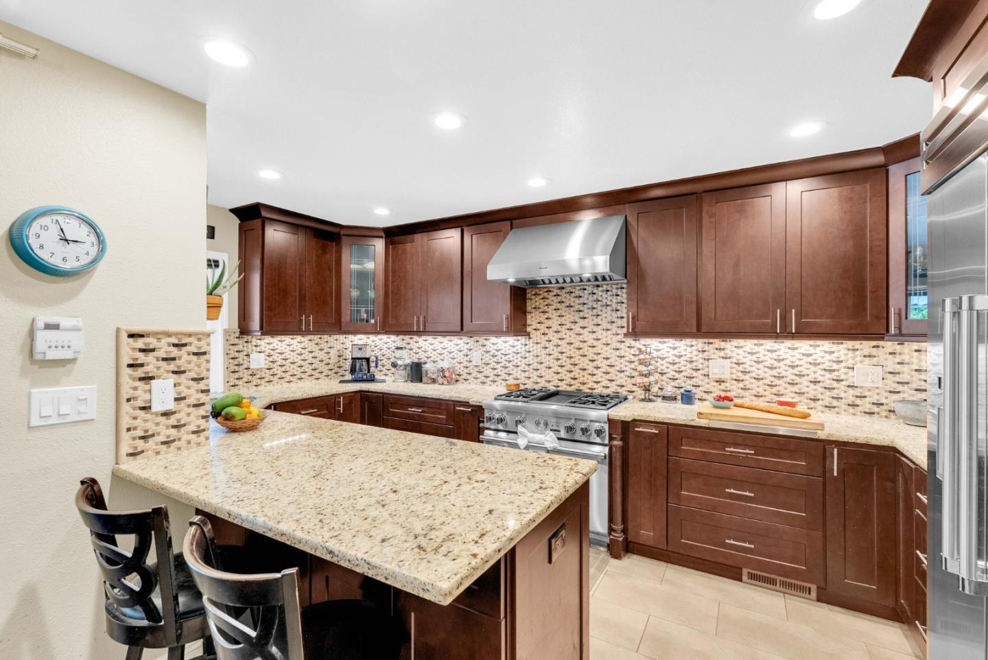 Located on a cul de sac in the heart of Blossom Valley, this beautiful East facing single story home features 3 bedrooms and 2 bathrooms and desired schools including Bertha Taylor Elementary School, Bernal Intermediate School, and Santa Teresa High School. Inside, the thoughtfully designed layout offers both a dining room and a spacious living room highlighted by pitched ceilings and an abundance of natural light. The chef inspired kitchen is truly the heart of the home, complete with a premium Thermador gas range and oven, built in refrigerator, microwave, dishwasher and granite countertops. The primary suite features direct slider access to the backyard patio, creating a seamless indoor outdoor connection. 2 additional bedrooms and a hall bathroom complete the functional floor plan. Step outside to your private backyard retreat featuring a covered patio area, sparkling pool and jacuzzi, custom pavers, and mature avocado and lemon trees that produce abundantly throughout the year. Located near Highways 85 and 87, with close proximity to Costco Wholesale, Kaiser Permanente San Jose Medical Center, Safeway, Target, local dining, La Colina Park, Palmia Park, and the scenic trails and golf surrounding Santa Teresa County Park, this home delivers the ideal Blossom Valley lifestyle.