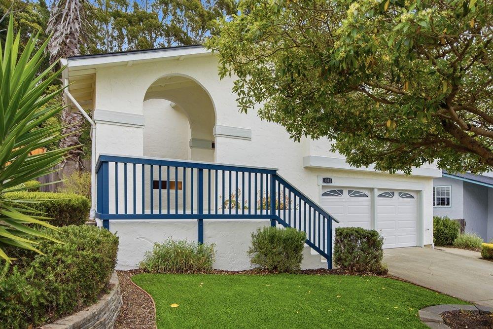 Nestled in the sun-drenched hills of desirable Park Pacifica & overlooking a lush natural preserve, this exceptional home offers the perfect blend of flexibility, comfort, & convenience. The thoughtfully designed floor plan features 4BR/3BA, including a permitted 950± sq. ft. lower-level suite. The light-filled main level offers 3BR/2BA, rich hardwood floors, crown molding, fresh paint, contemporary LED lighting, & a welcoming living room with a remote-controlled gas fireplace. The gourmet kitchen features granite countertops, maple cabinetry, stainless steel appliances, & an eat-up bar that opens to the living & dining areas. The spacious primary suite includes a jetted tub, bidet, & private deck access. The permitted 1BR/1BA suite offers its own entrance, full kitchen with Caesarstone counters, living room, dining area, en-suite bedroom, & patio access. Enjoy it as part of the main home or as a private living space for multigenerational living, guests, a home office, or potential rental income. Additional highlights include owned solar panels with electricity costs typically under $100/year, EV charging, seismic upgrades, & an epoxy-finished garage with custom storage. Beautifully landscaped grounds &  close to shopping, dining, beaches, hiking trails, SF, & Silicon Valley.