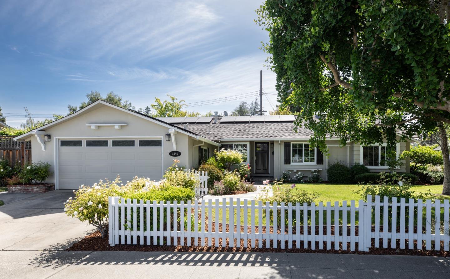 A truly special & inviting home in Mountain Views highly sought-after Waverly Park neighborhood. Thoughtfully remodeled, meticulously maintained and continually enhanced including the addition of an owned energy saving solar system. Offering 4 bedrooms, 2.5 bathrooms,  an expansive living room with a marble fireplace, views to the luscious backyard & French doors to the open family room, dining room, and beautifully updated kitchen with a delightful breakfast nook. The bedroom wing with 4 spacious bedrooms including a Primary Suite, a charming bedroom with a window seat, and another with built in bookcases. Three of the bedrooms share a remodeled hall bath. California living shines throughout, with picturesque garden views from nearly every window. Enjoy blooming roses, lush hydrangeas, and a stunning row of white Crepe Myrtles that create a serene backdrop to the private backyard. Beautiful Slate patio outside the family room. Ideally located just two blocks from the YMCA and El Camino Hospital, with easy access to Stevens Creek Trail, neighborhood parks, and top local amenities, this exceptional home offers the perfect balance of convenience, charm, and style. A rare opportunity to own a beautifully updated home in one of Mountain Views most beloved neighborhoods.