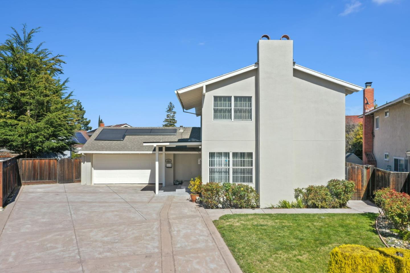 Beautifully updated Blossom Valley home on a rare 12,000 sq ft cul-de-sac lot! This 4-bedroom residence offers an inviting floor plan with fresh interior updates, dual-pane windows, hardwood-style flooring, recessed lighting, crown molding, a dramatic entry, remodeled baths, and a granite kitchen with a bay window. Enjoy comfortable living spaces, including a family room with a wet bar, a marble fireplace, and a hearth. Notable upgrades include dual heating and A/C, copper plumbing, a 200-amp electrical panel, a tankless water heater, a security system, leased Tesla solar, newer exterior stucco, and more. The expansive backyard is built for entertaining with a sparkling pool, generous patio space, mature landscaping, and room to garden, play, or relax. Oversized driveway parking and an exceptional lot create flexibility rarely available in this neighborhood. Conveniently located near shopping, dining, parks, schools, and commuter routes. A special Blossom Valley opportunity combining move-in-ready comfort, outdoor lifestyle, and a truly standout lot.