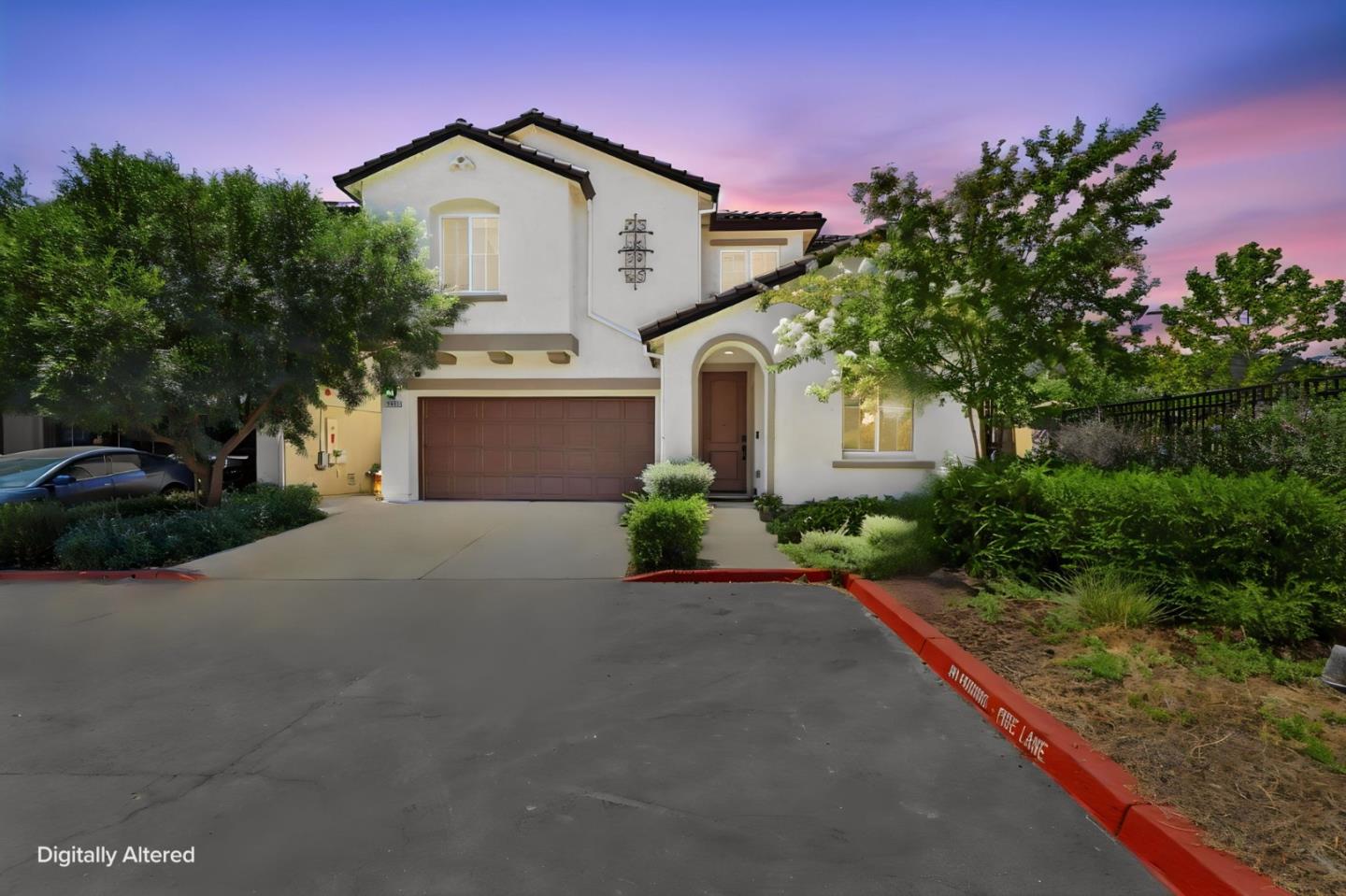 Beautifully maintained Glen Loma Ranch home nestled near Christmas Hill Park in the heart of Gilroy. Built in 2016, this spacious 4-bedroom, 3-bath residence offers approximately 2,381 square feet of thoughtfully designed living space with an attached two-car garage. A desirable first-floor bedroom and full bathroom provide exceptional flexibility for guests, multigenerational living, or a private home office. Upstairs, a spacious loft offers additional living space, ideal as a media room, playroom, or workspace. The gourmet kitchen is the heart of the home, featuring rich wood flooring, stainless steel appliances, abundant cabinetry, and an oversized center island perfect for casual dining and entertaining. The open-concept kitchen flows seamlessly into the dining area and inviting family room, creating an ideal gathering space for everyday living and special occasions.  Step outside to the low-maintenance backyard, where a stylish concrete patio provides the perfect setting for outdoor dining and relaxation. A tiered stone retaining wall showcases beautiful native landscaping while offering generous built-in bench seating for family and guests.