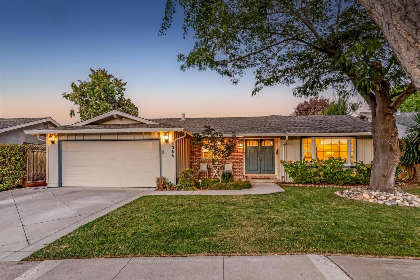 Welcome to 5366 Rucker Dr., a charming 3-bedroom, 2-bath home offering 1,493 sq. ft. on a generous 6,360 sq. ft. lot. Warm and inviting, it features beautiful hardwood floors, a cozy fireplace, and a large bay window with mountain views and mature, tree-lined streets. The versatile floor plan includes a separate family room, formal dining room, and eat-in kitchen. The recently completed resort-style backyard is ideal for family living and entertaining, featuring an outdoor living area, heated pergola, cooking space, play structure, and an 9-tree fruit orchard with orange, cherry, apple, fig, plum, pear, and lemon trees. The finished 2-car garage offers epoxy flooring, high-quality cabinetry, a 128-inch projector screen, and Level 2 EV charging. Additional highlights include new fencing, underground power lines, forced-air heating, central A/C, and double-pane windows. Walk to Noddin Elementary, Union Middle, and Leigh High School. Enjoy easy access to major highways and nearby Whole Foods, Trader Joes, Safeway, Target, Costco, and Oakridge Mall. A wonderful opportunity to enjoy comfort, convenience, and an exceptional outdoor lifestyle.